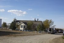 The HWC crew repairs the roof at Creative Acres animal sanctuary