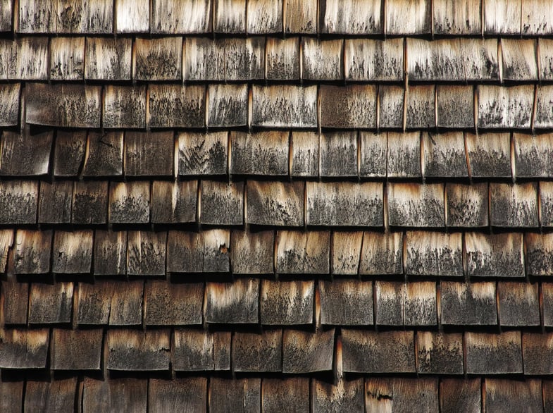 Pattern of cedar shingles on old Cape Cod building-1