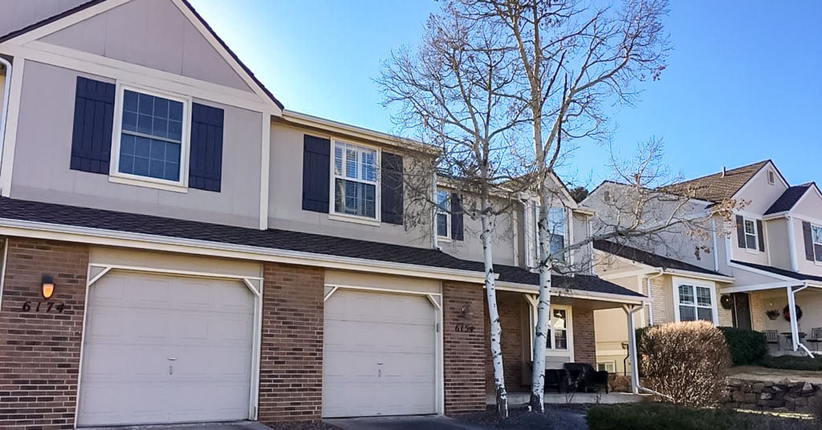 Mill Creek multifamily homes before siding restoration project